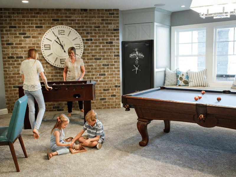 Family in game room next to safe